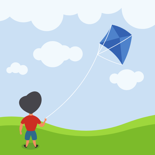 A child is playing with a kite