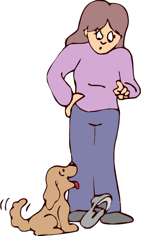 woman scolding dog