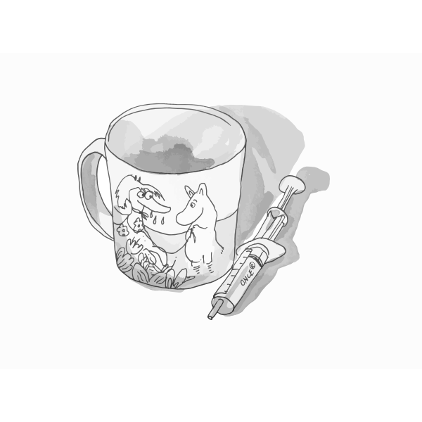 Coffee cup and a syringe