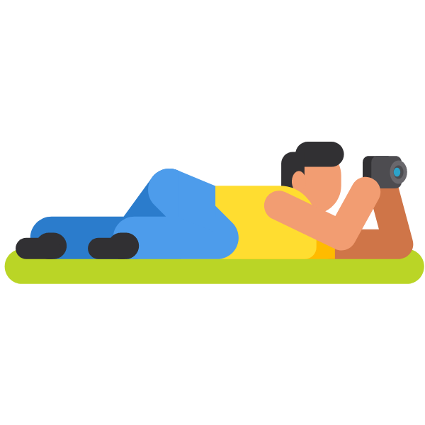 Photographer in lying position