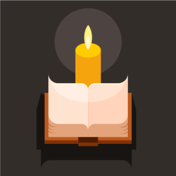 Book by the burning candle